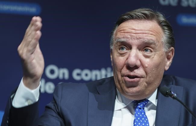 Quebec premier announces vaccine passport system after rise in COVID-19 cases